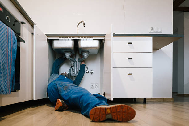 Professional Emergency Plumber technician working in Lakeside, MT